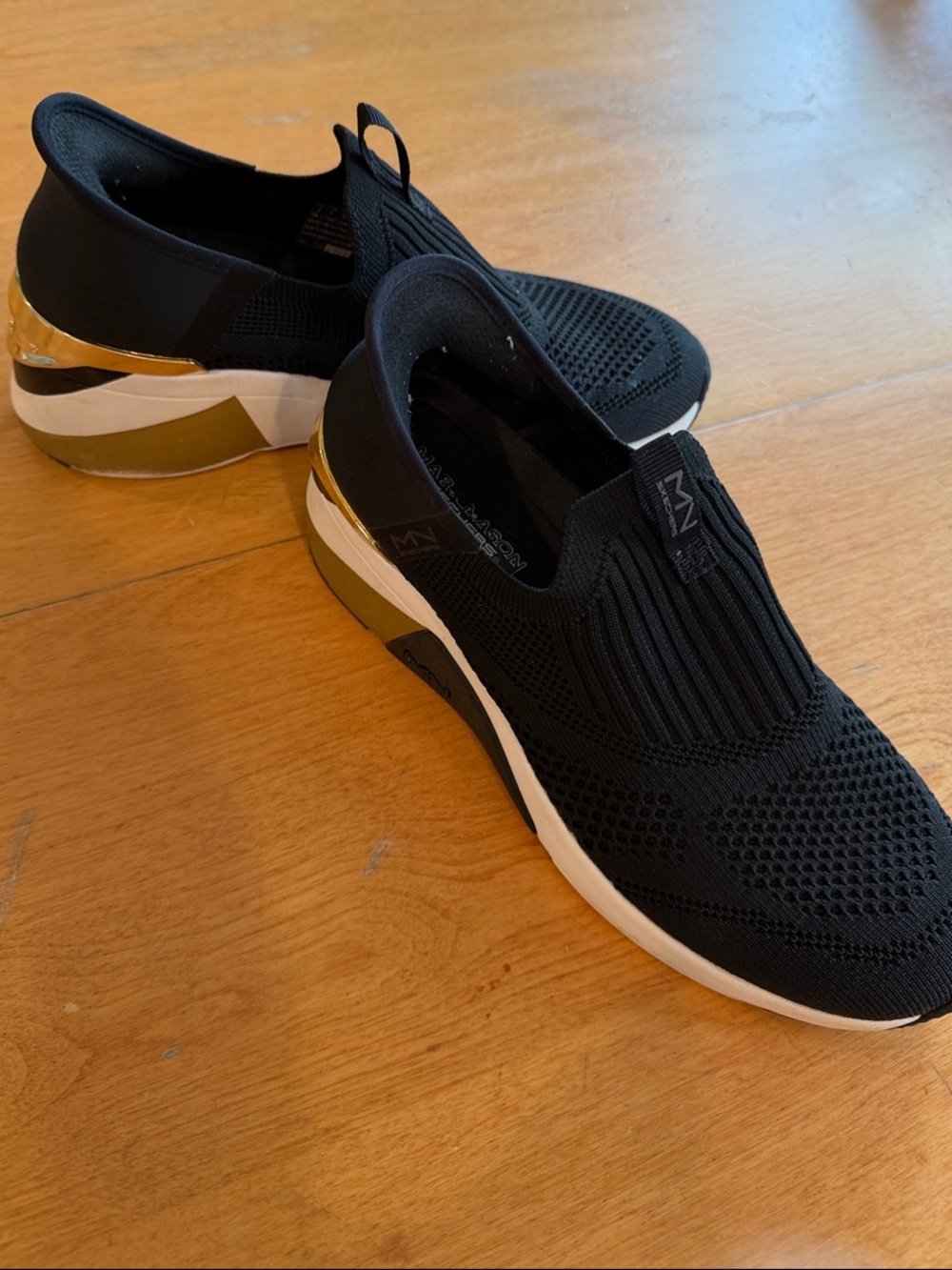Skechers Black Knit Slip-On Sneakers with Gold Heel. Michael Jordon